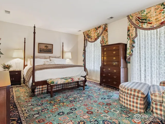 a bedroom with a bed and a closet