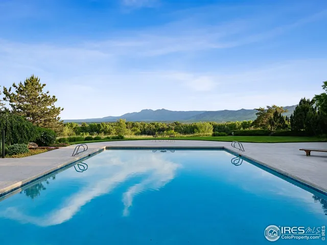 a view of swimming pool with mountain view