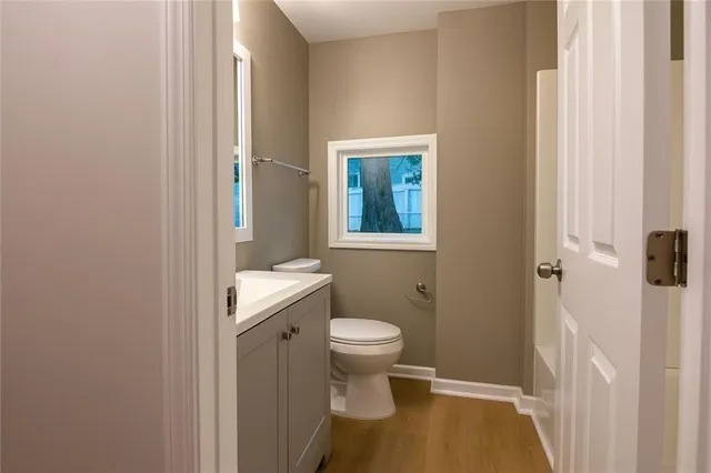 a view of a room with rack and wooden floor