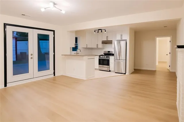 a view of a kitchen with a sink