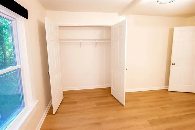 a bathroom with a sink toilet and a mirror
