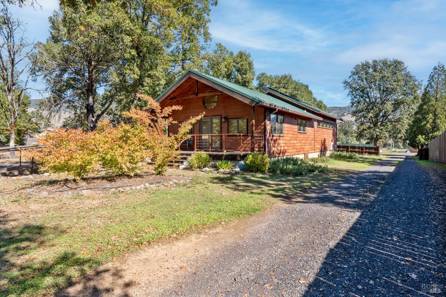 10185 East Road Redwood Valley, CA 95470 - Photo 16 of 17 a front view of a house with a yard