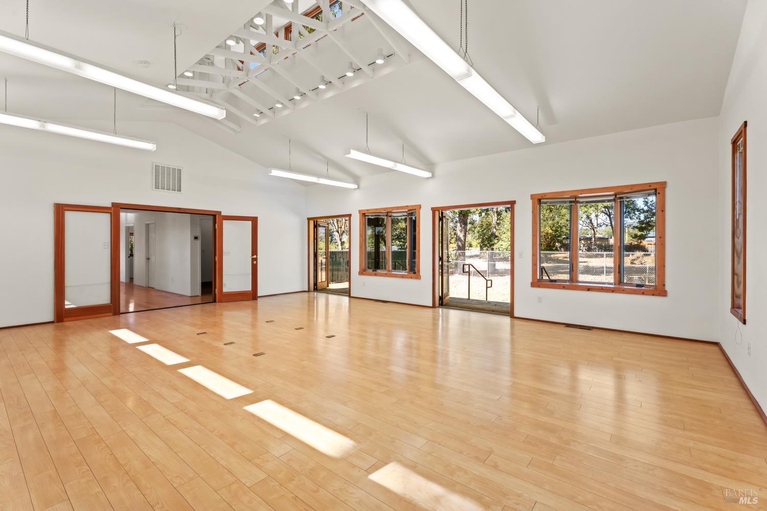 10185 East Road Redwood Valley, CA 95470 - Photo 10 of 17 a view of an empty room with window and wooden floor