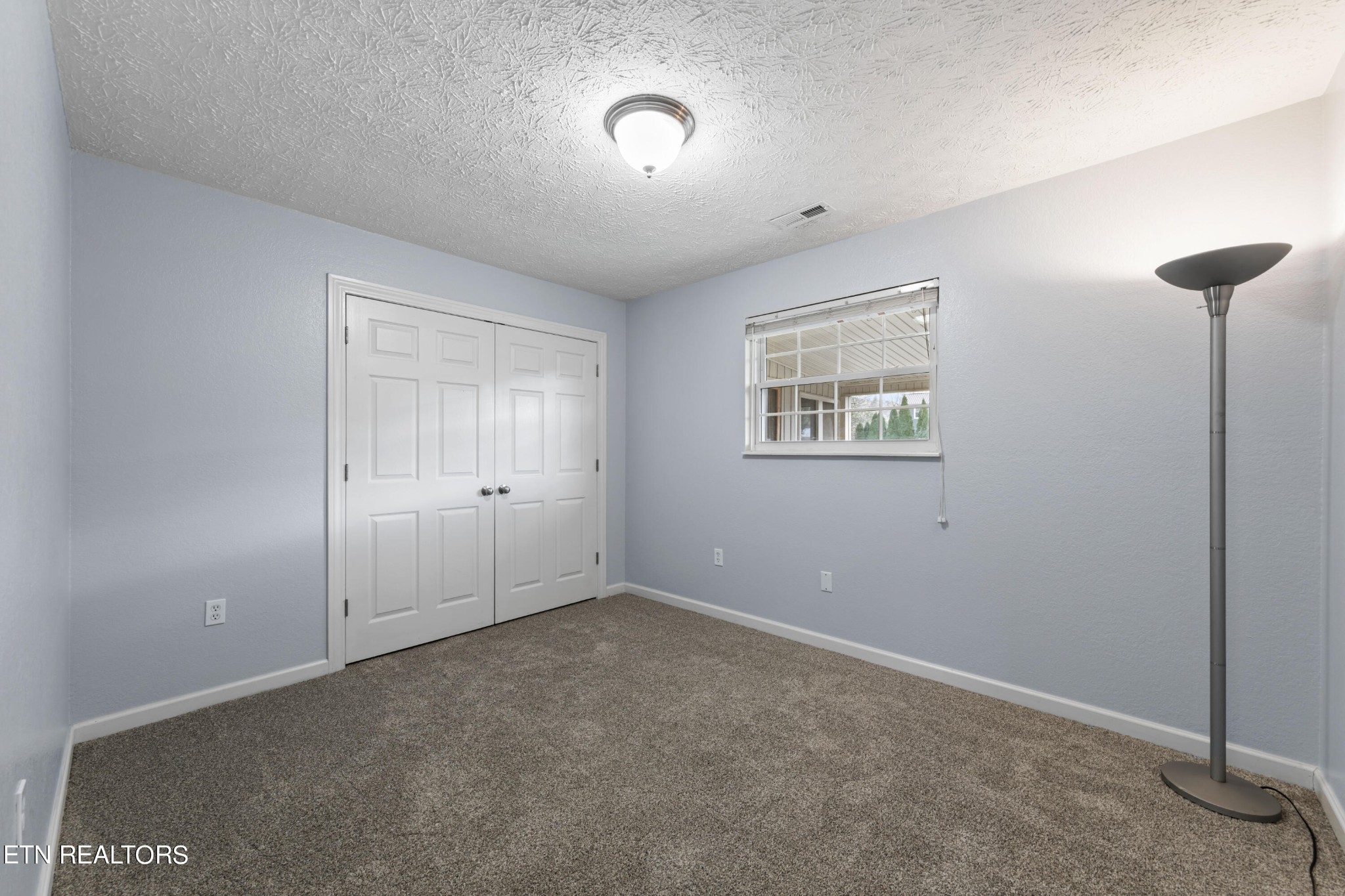 2252 Shinbone Road Sevierville, TN 37876 - Photo 14 of 27 a view of an empty room with a window