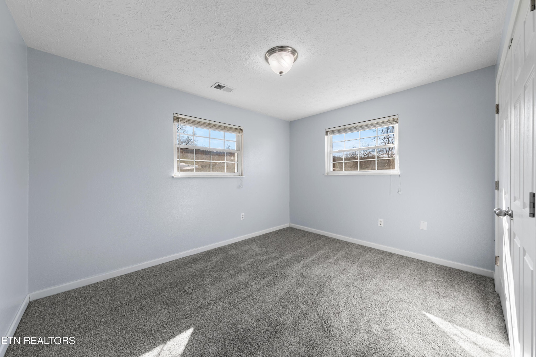 2252 Shinbone Road Sevierville, TN 37876 - Photo 16 of 27 a view of an empty room with a window