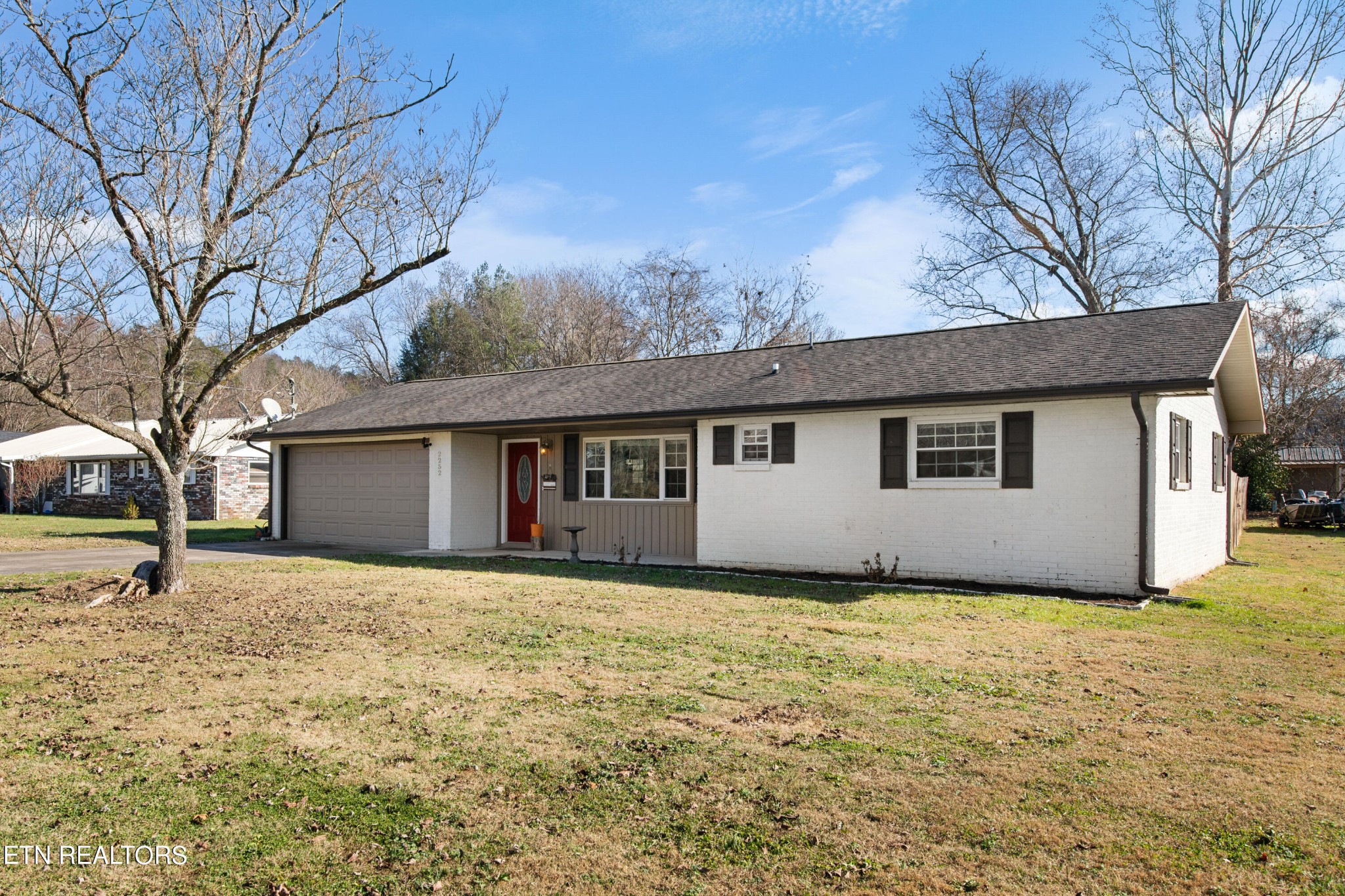 2252 Shinbone Road Sevierville, TN 37876 - Photo 2 of 27 a house that has a backyard