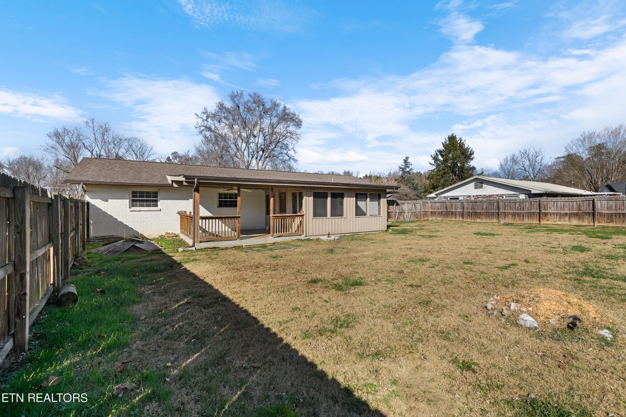 2252 Shinbone Road Sevierville, TN 37876 - Photo 26 of 27 a view of a house with backyard and trees