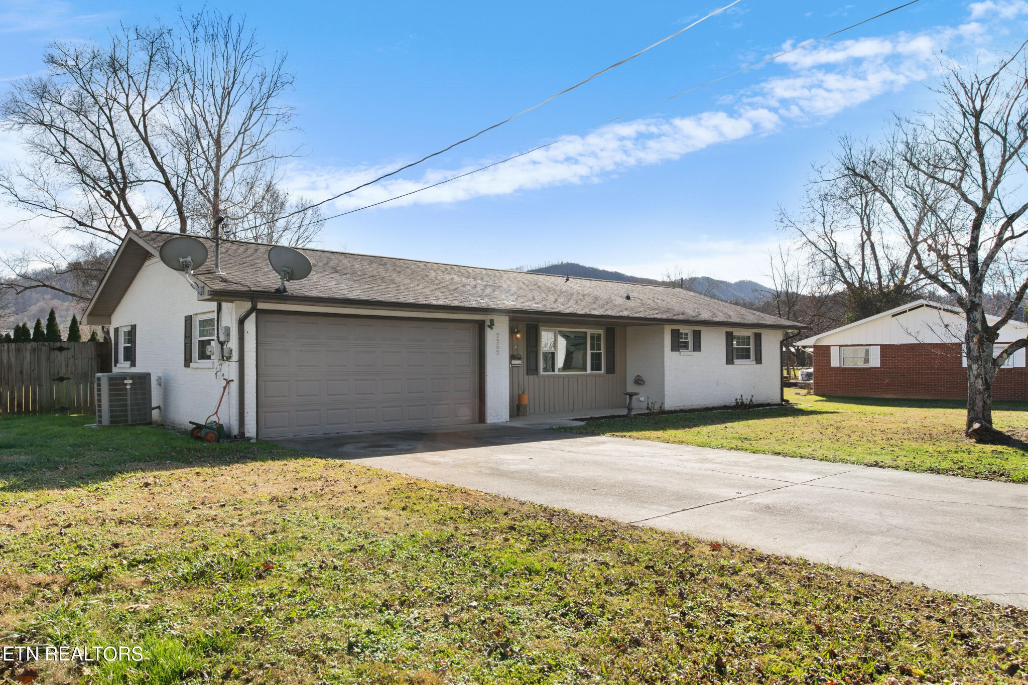 2252 Shinbone Road Sevierville, TN 37876 - Photo 3 of 27 a front view of a house with a yard