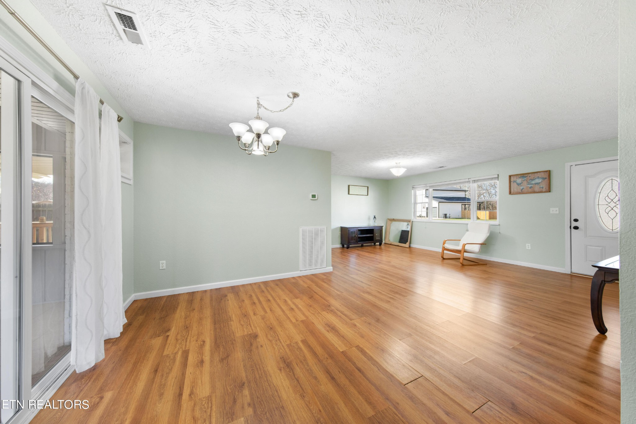 2252 Shinbone Road Sevierville, TN 37876 - Photo 4 of 27 a view of empty room with wooden floor