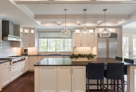 a kitchen with counter top space and appliances