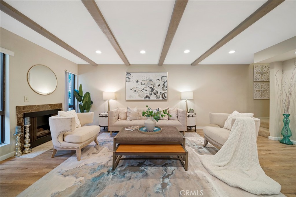 447 West Duarte Road, Unit 6 Arcadia, CA 91007 - Photo 1 of 1 a living room with furniture potted plant and a fireplace