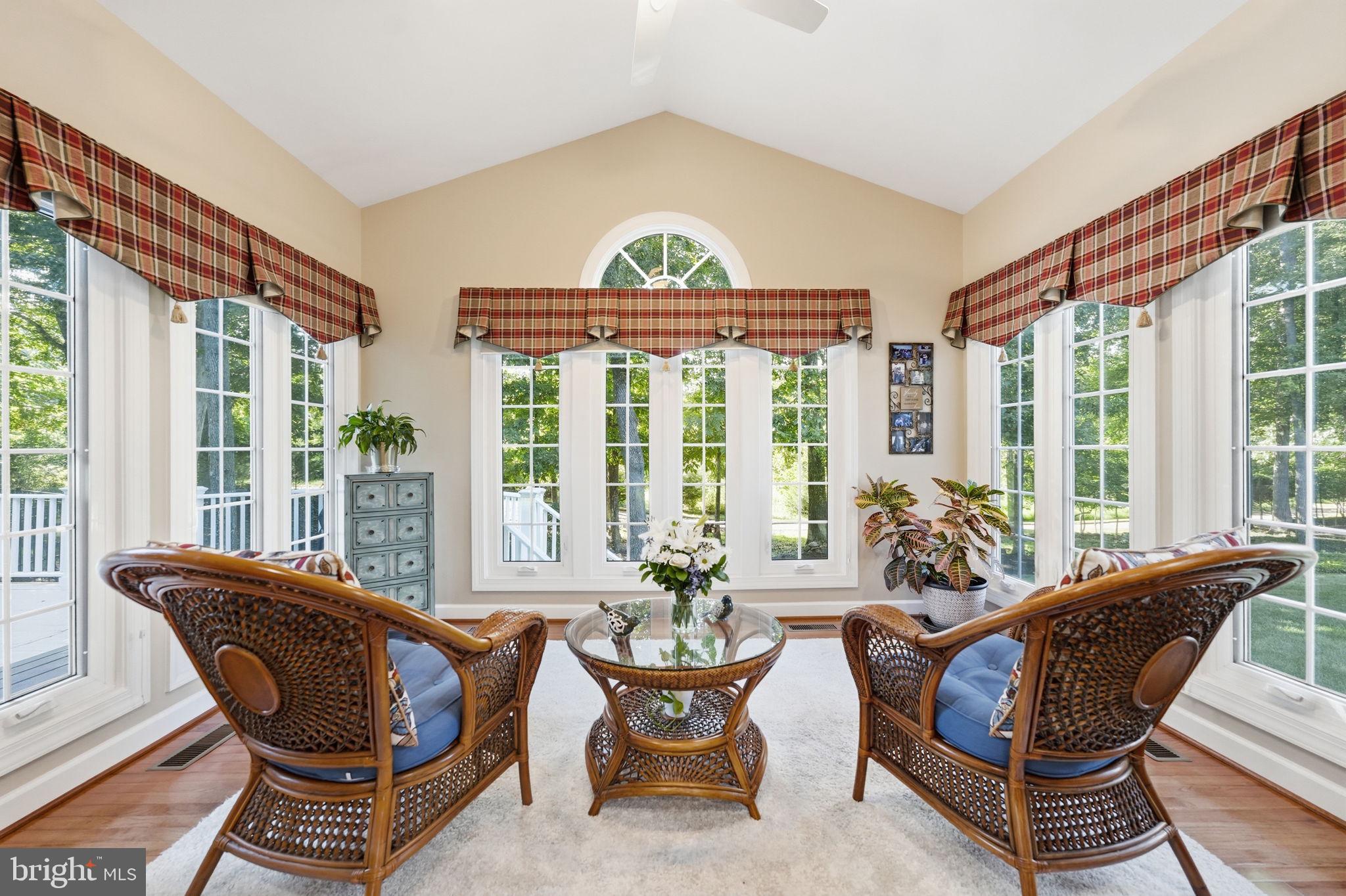 14261 Clubhouse Road Gainesville, VA 20155 - Photo 18 of 102 Sun room with vaulted ceilings - what a view!