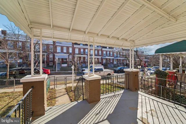 a view of a chairs and table in a patio