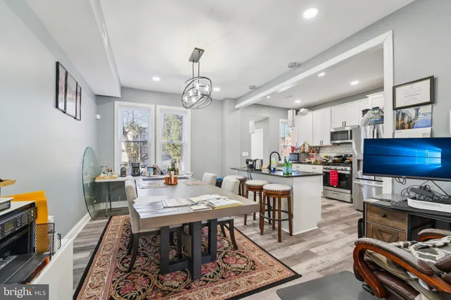 a view of a dining room with furniture