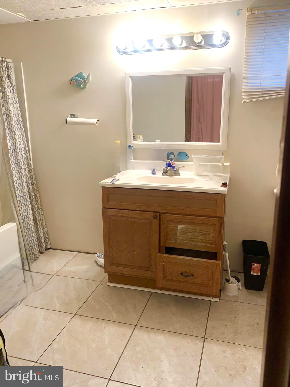 9904 Lanham Severn Road Lanham, MD 20706 - Photo 11 of 13 Spacious Full Bathroom with tub shower and toilet