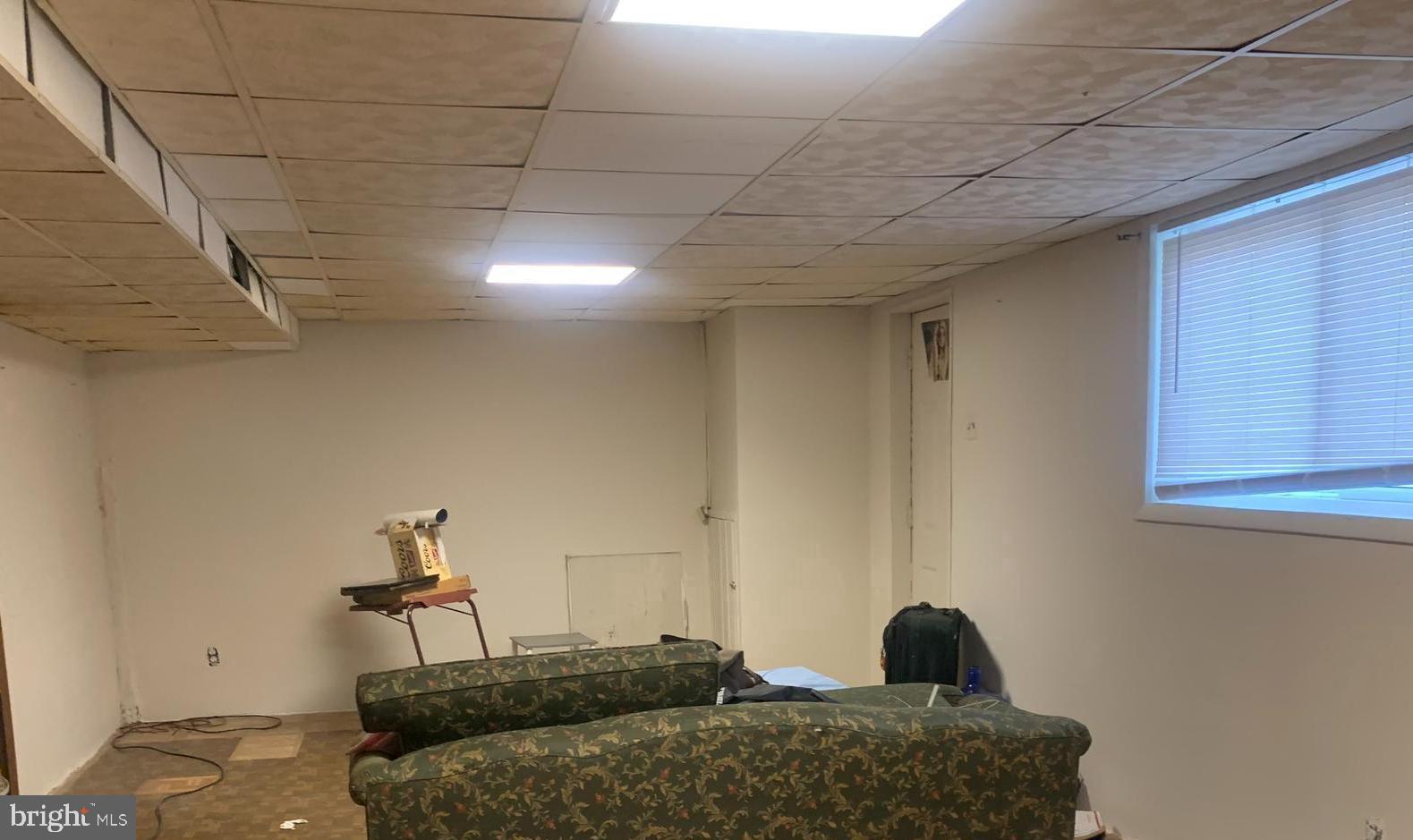 9904 Lanham Severn Road Lanham, MD 20706 - Photo 12 of 13 Living Area in the basement with a bonus room