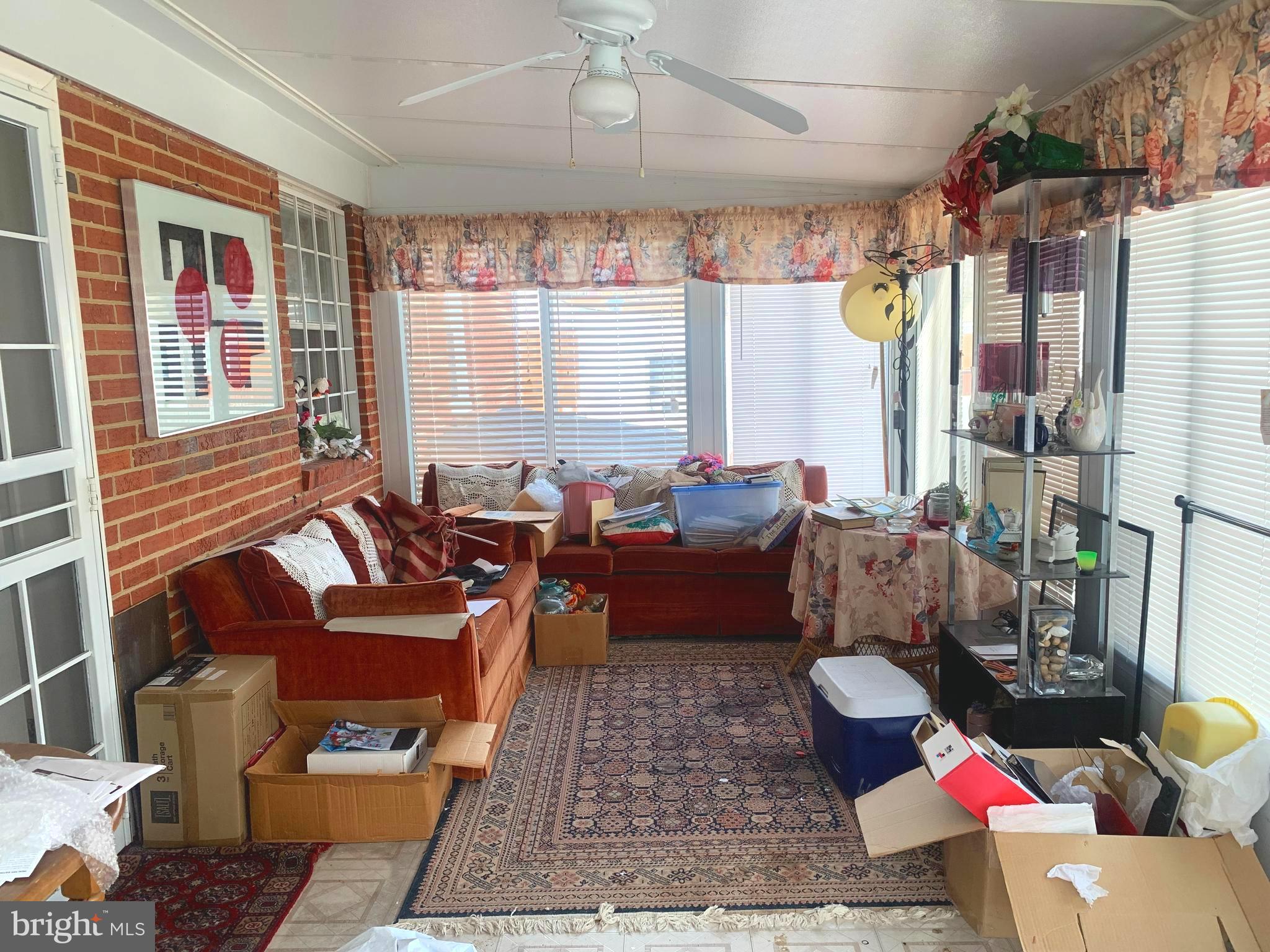 9904 Lanham Severn Road Lanham, MD 20706 - Photo 13 of 13 Large and enclosed Sun room