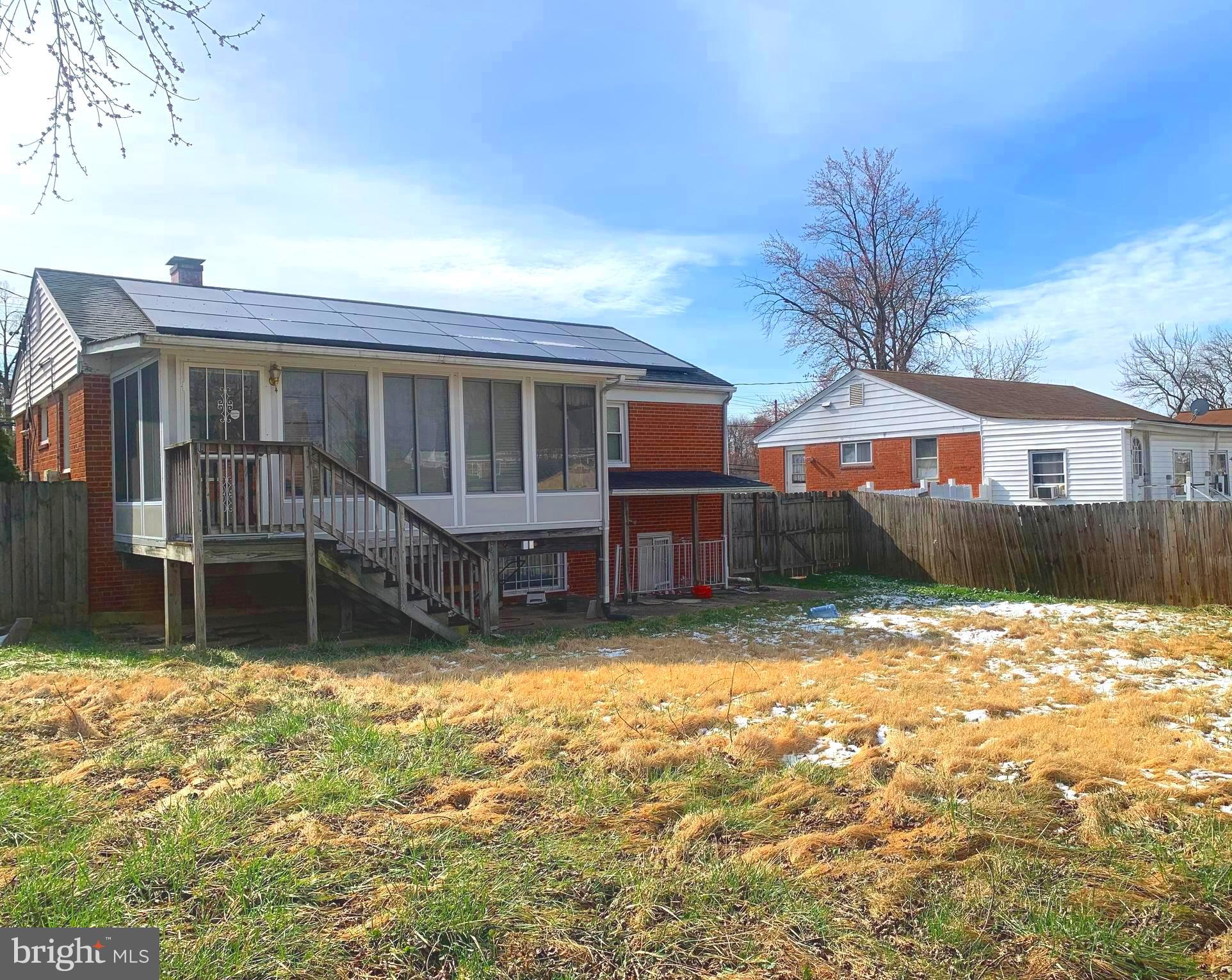 9904 Lanham Severn Road Lanham, MD 20706 - Photo 2 of 13 Large back yard with sun room and basement access