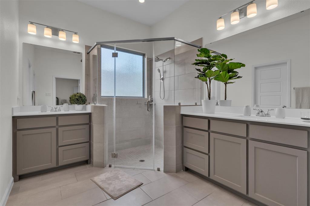 228 Palo Duro Bend Rhome, TX 76078 - Photo 17 of 35 a bathroom with a granite countertop sink a potted plant and a mirror