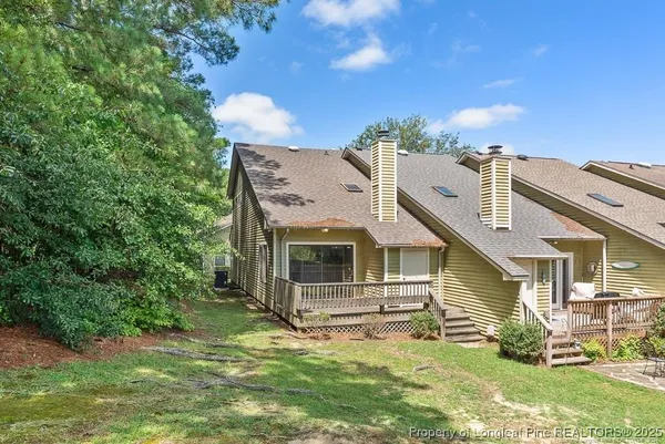 front view of a house with a big yard