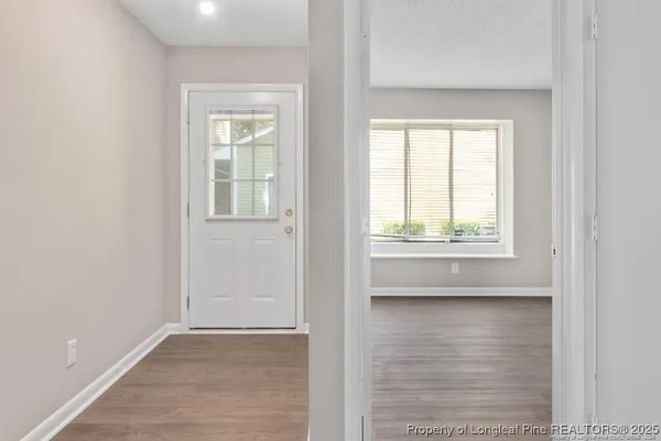 an empty room with windows