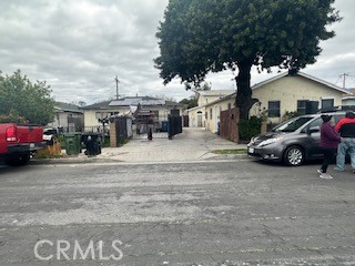 a view of a cars in front of a house
