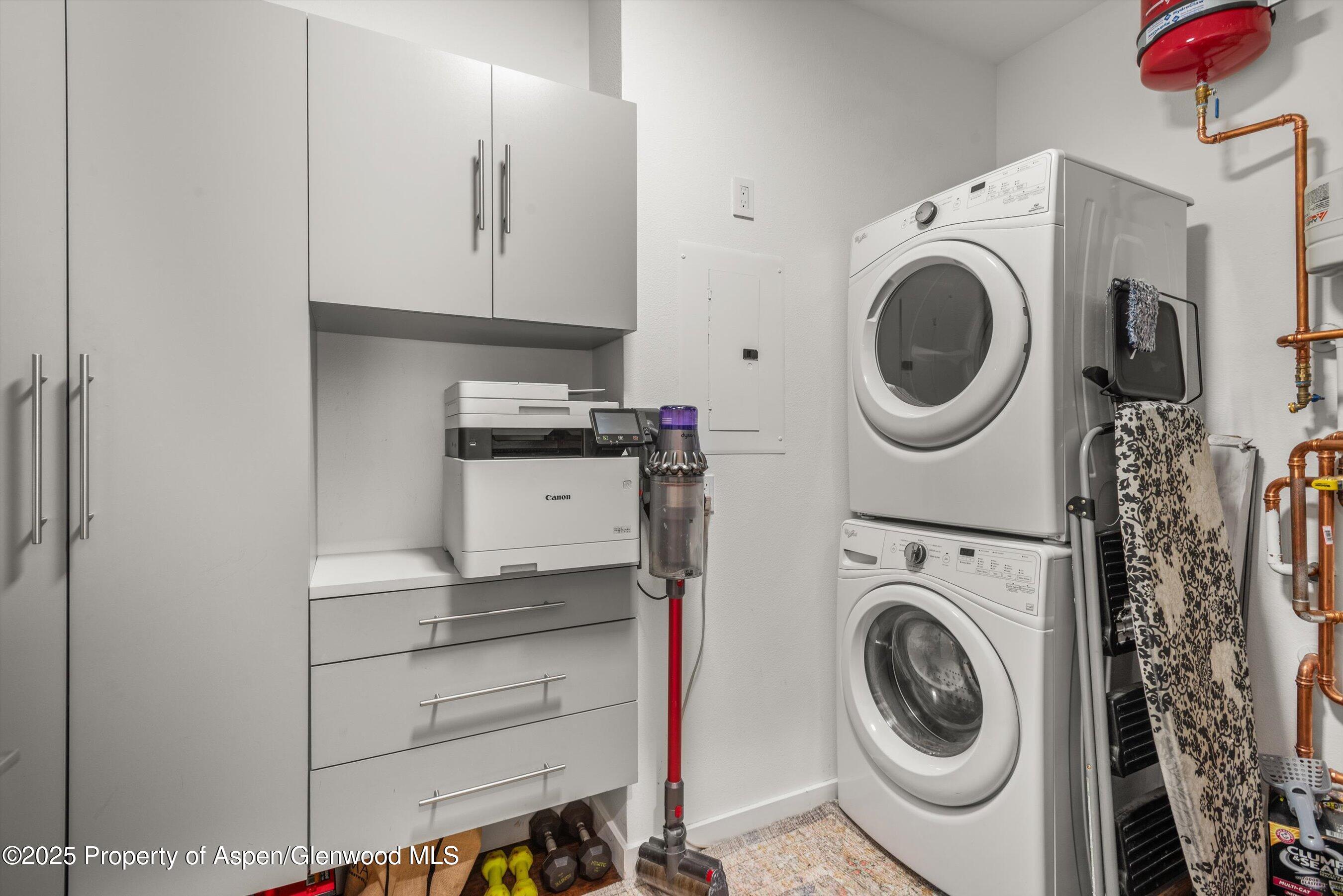 1400 East Valley Road, Unit 115 Basalt, CO 81621 - Photo 16 of 17 a view of a storage and utility room with washer and dryer