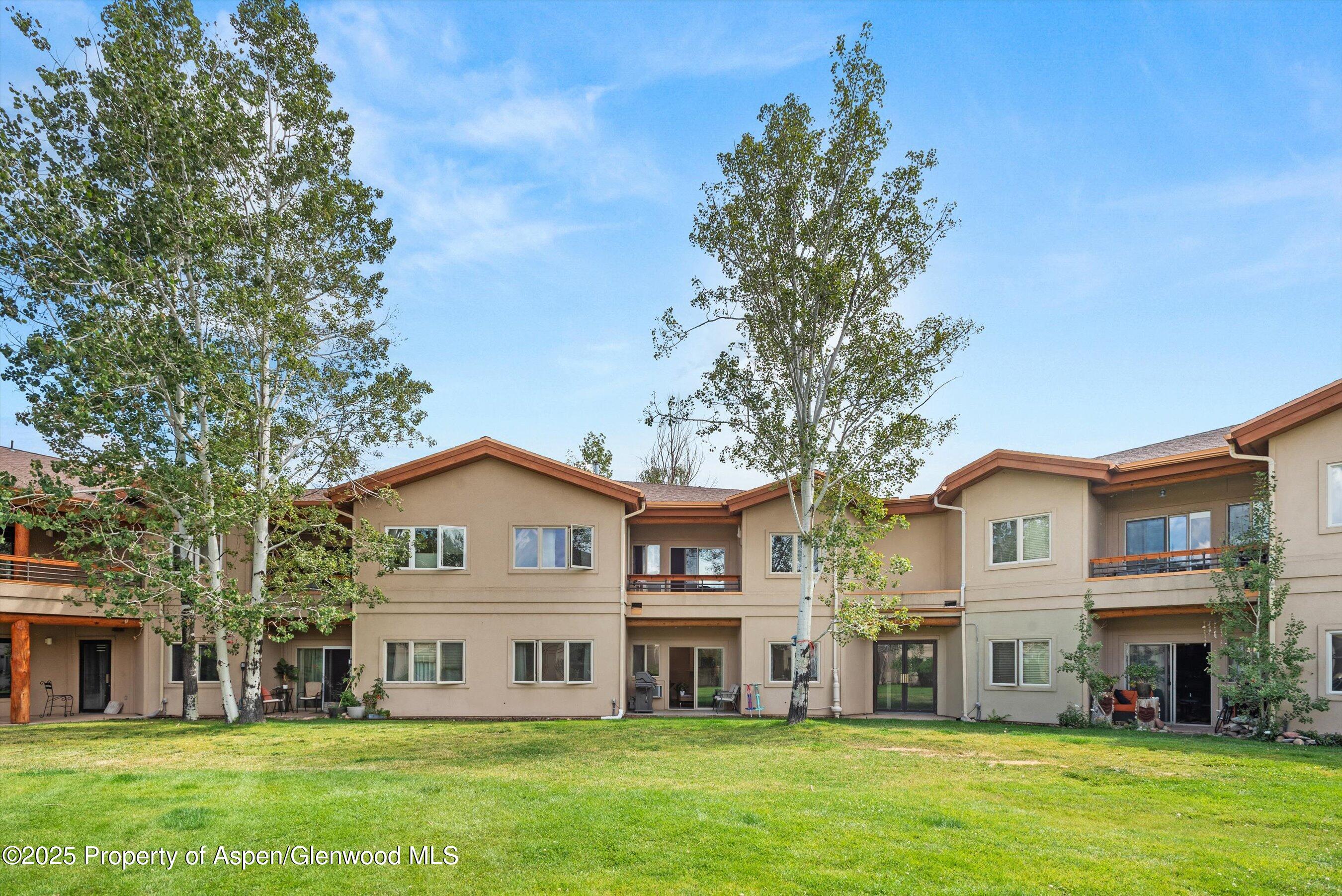 1400 East Valley Road, Unit 115 Basalt, CO 81621 - Photo 17 of 17 a view of house with a yard