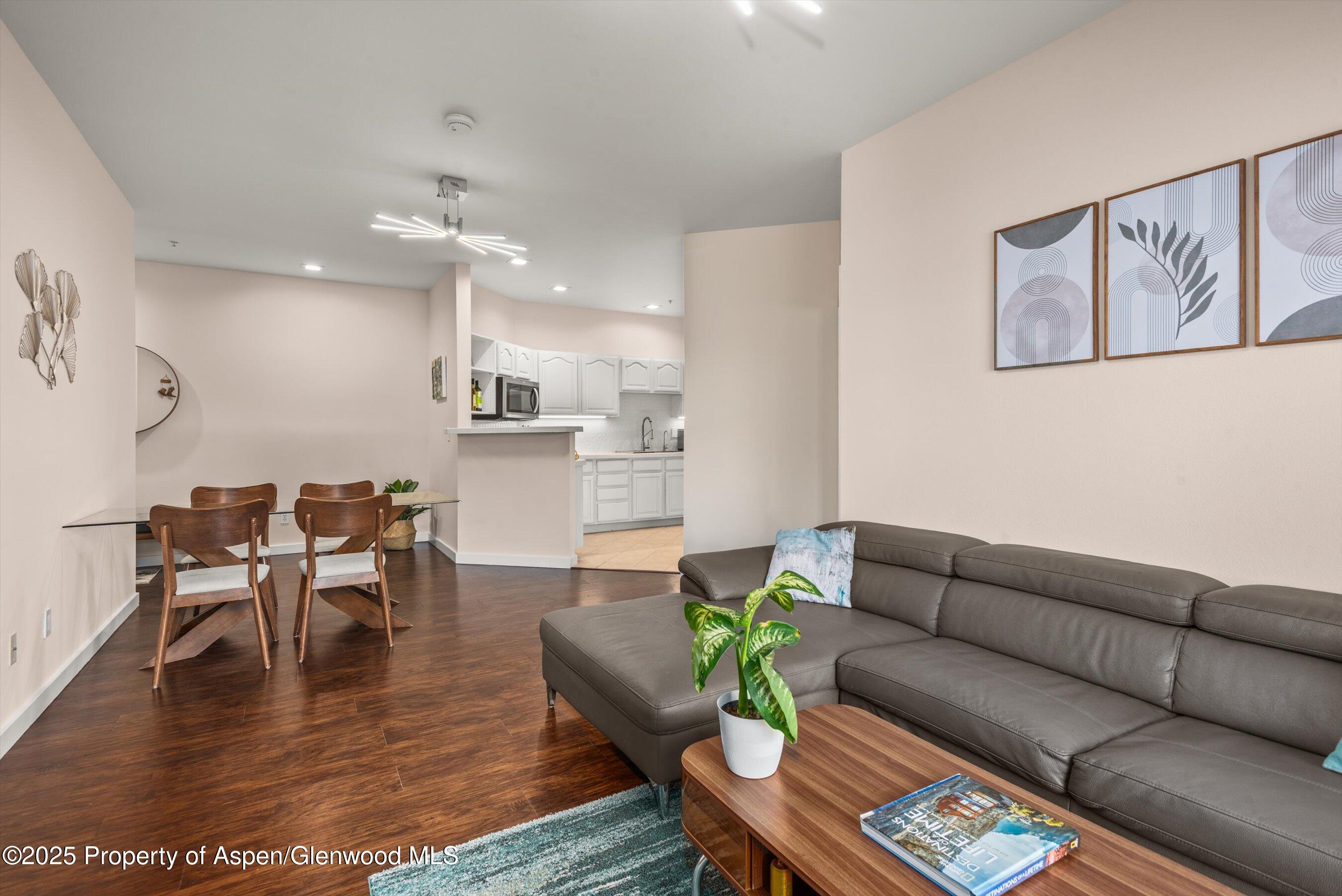 1400 East Valley Road, Unit 115 Basalt, CO 81621 - Photo 4 of 17 a living room with furniture kitchen view and a dining table