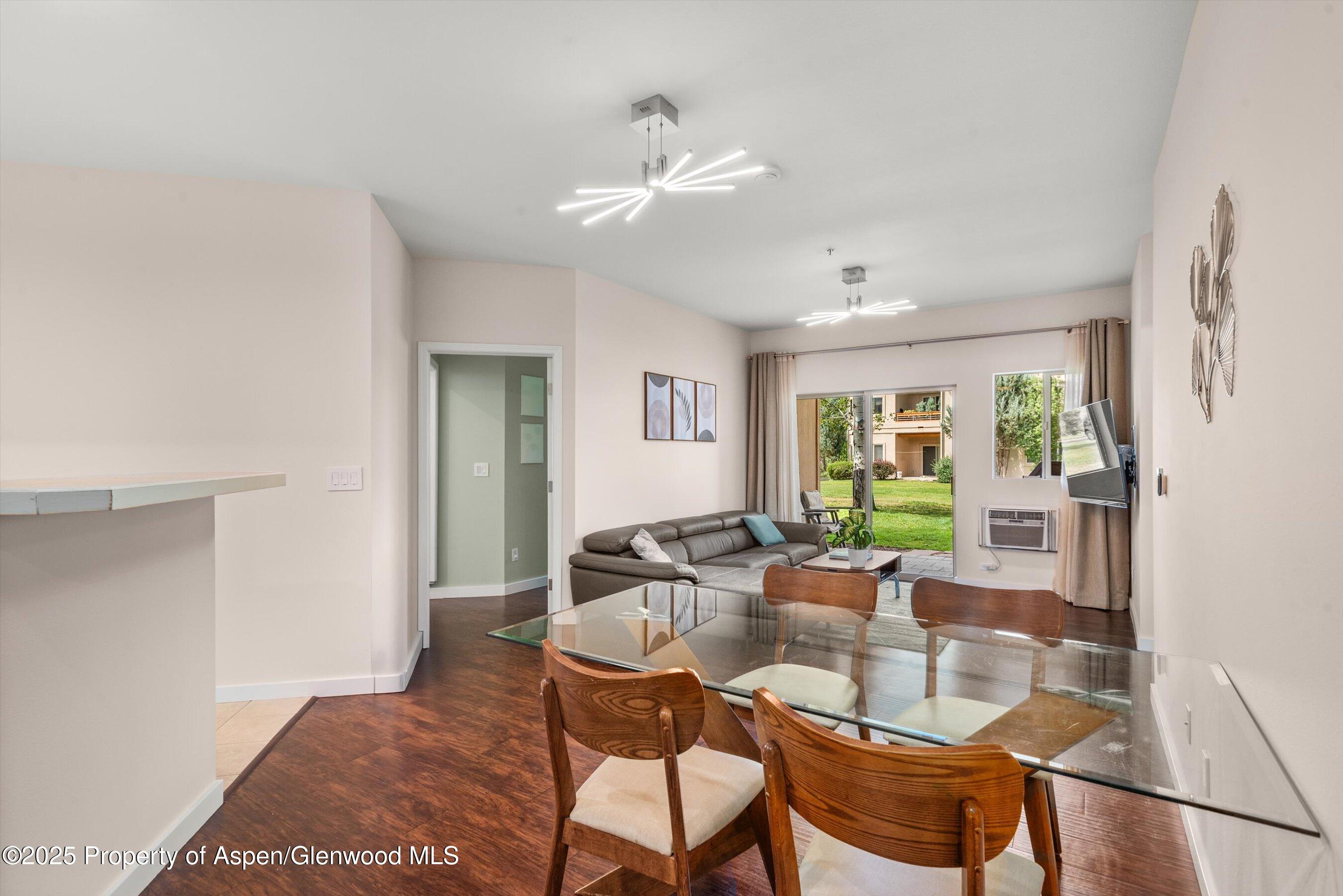 1400 East Valley Road, Unit 115 Basalt, CO 81621 - Photo 8 of 17 a dining room with furniture and window