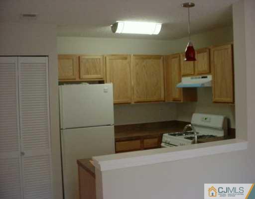 1016 Edpas Road New Brunswick, NJ 08901 - Photo 2 of 7 a hallway with storage and utility