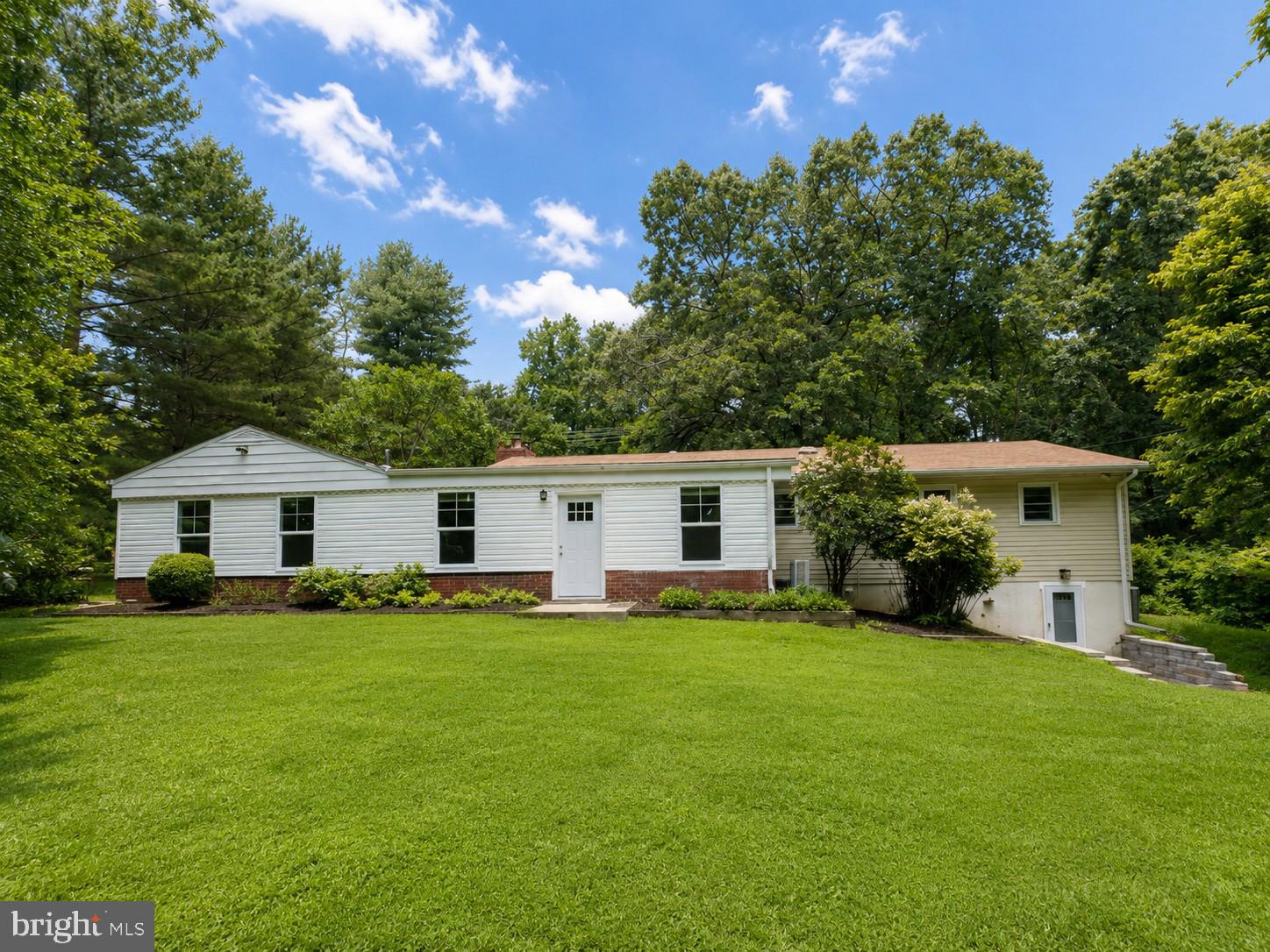 12658 Scaggsville Road Highland, MD 20777 - Photo 13 of 13 a front view of house with yard and green space