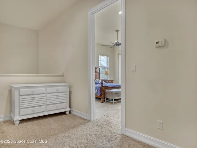 a view of room and bathroom