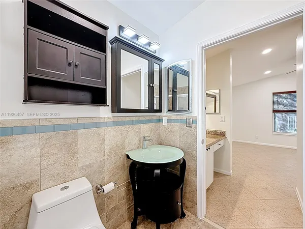 a bathroom with a sink and a toilet