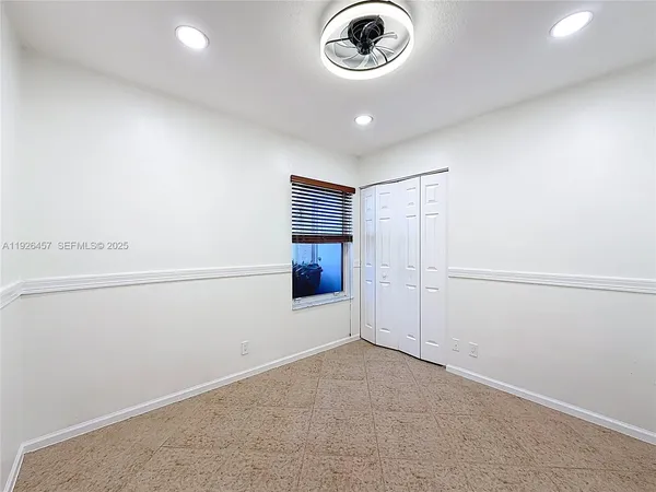 a view of empty room with a washer and dryer