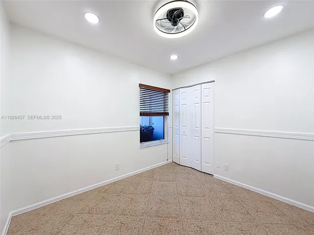 a view of empty room with a washer and dryer