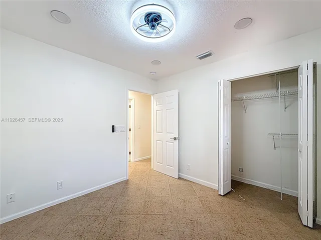 a view of a hallway to a room