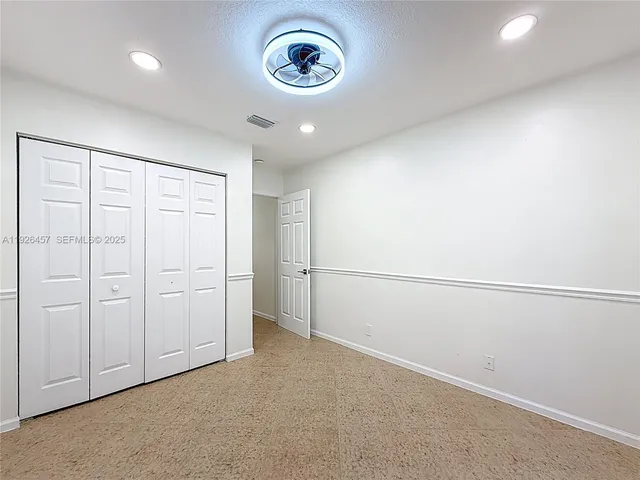 a view of a room with an empty space