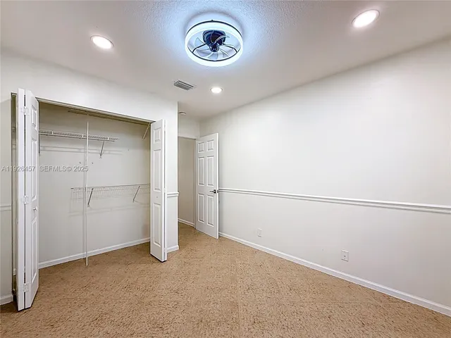 a view of a room with an empty space