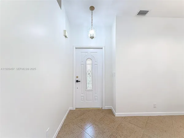 a view of a hallway with closet