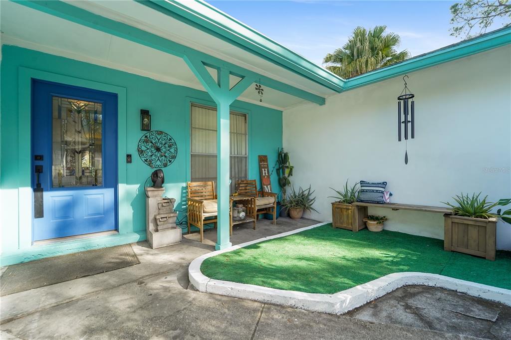 7523 Barry Road Tampa, FL 33634 - Photo 2 of 28 a house view with a garden space