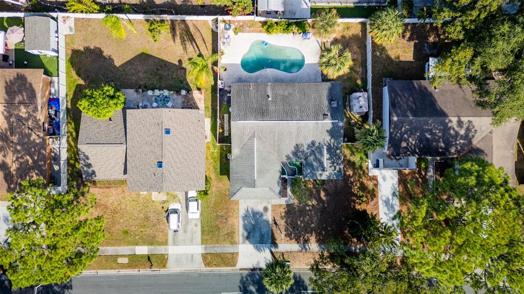 7523 Barry Road Tampa, FL 33634 - Photo 26 of 28 an aerial view of residential houses with outdoor space