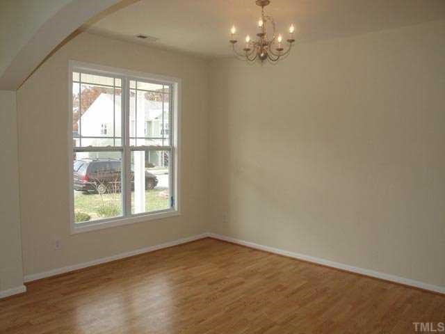 2215 Stoney Spring Drive Raleigh, NC 27610 - Photo 3 of 12 an empty room with a window