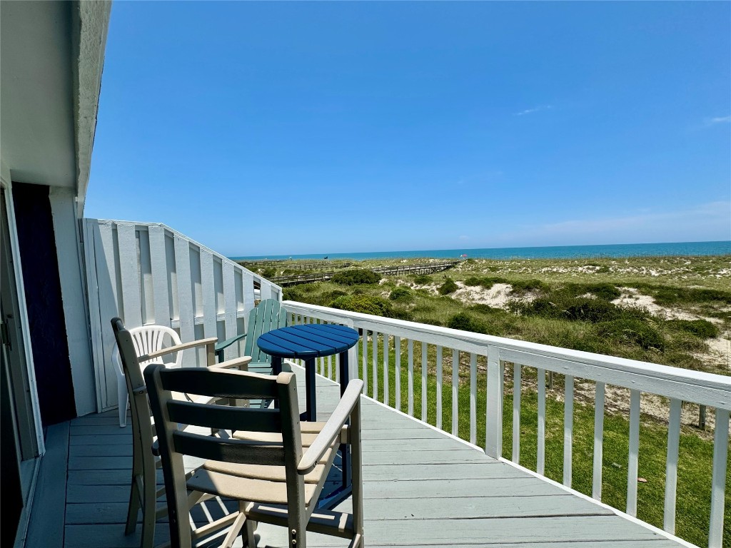 95118 Sandpiper Loop Fernandina Beach, FL 32034 - Photo 18 of 35 a view of a chairs and table on the deck