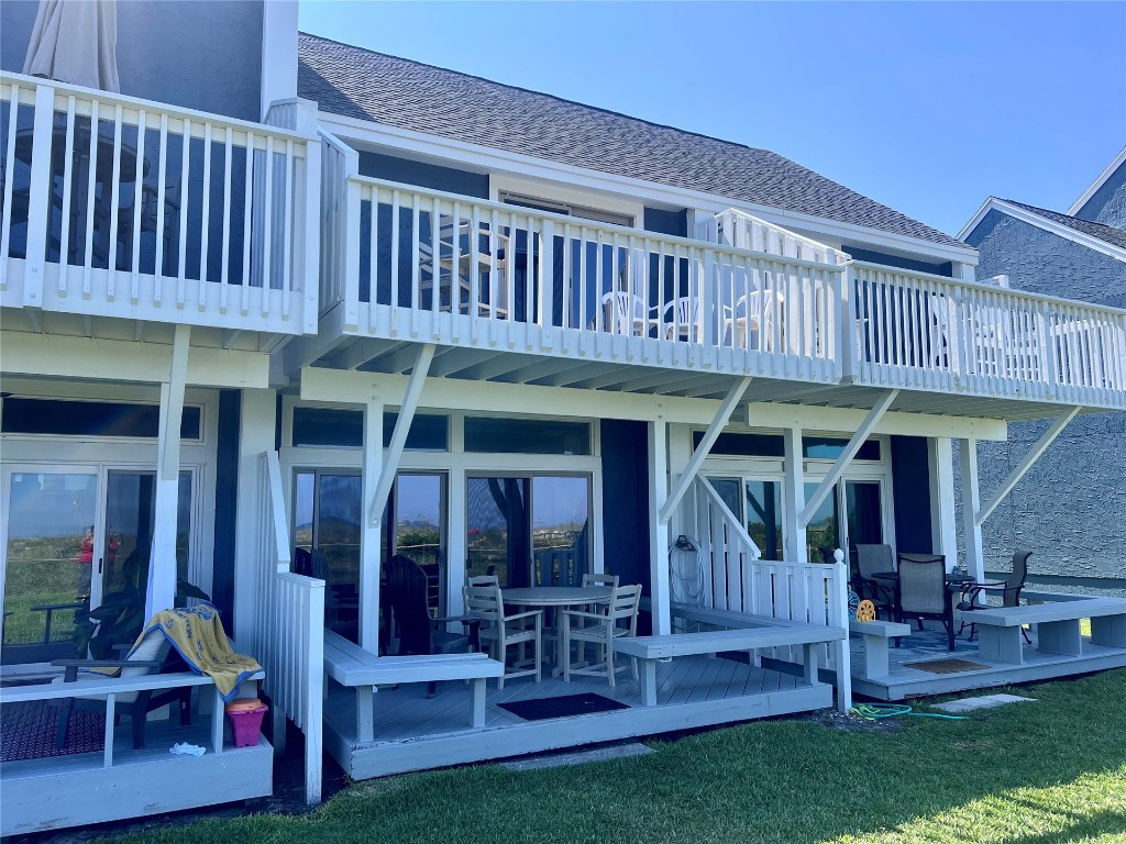 95118 Sandpiper Loop Fernandina Beach, FL 32034 - Photo 2 of 35 a view of a house with patio and a yard
