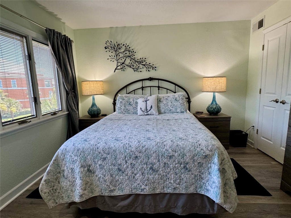 95118 Sandpiper Loop Fernandina Beach, FL 32034 - Photo 25 of 35 a bedroom with a bed and window