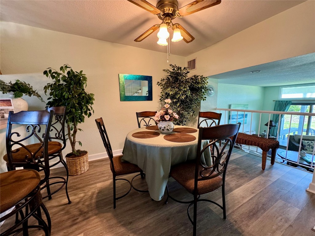 95118 Sandpiper Loop Fernandina Beach, FL 32034 - Photo 7 of 35 a view of a dining room with furniture and wooden floor
