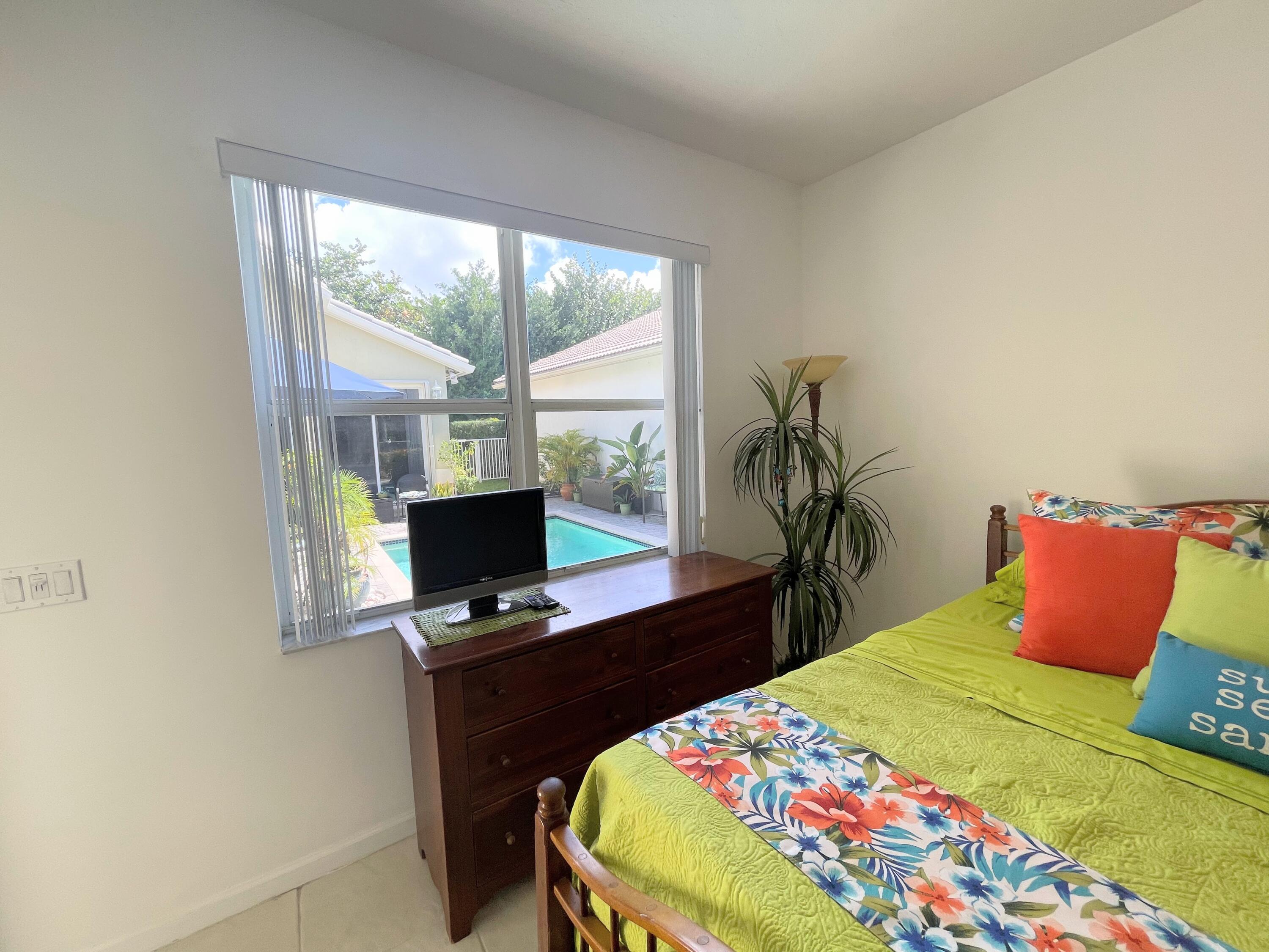 7060 Northwest Turtle Walk Boca Raton, FL 33487 - Photo 46 of 51 courtyard House Bedroom