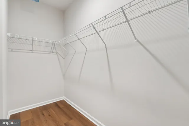 a view of a room with racks on the wall