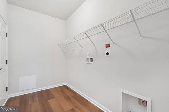 a view of a room with racks on the wall